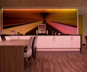 Large breakout area with storage cupboard for coffee machine and condiments